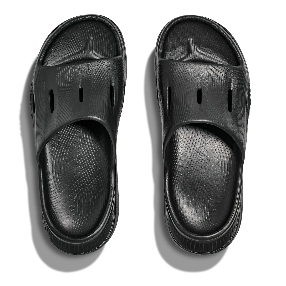 running in a basketball court area shoes Hoka Ora Recovery Slide 3