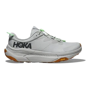running in a dock area shoes Hoka Transport - Harbor Mist - Lime Glow