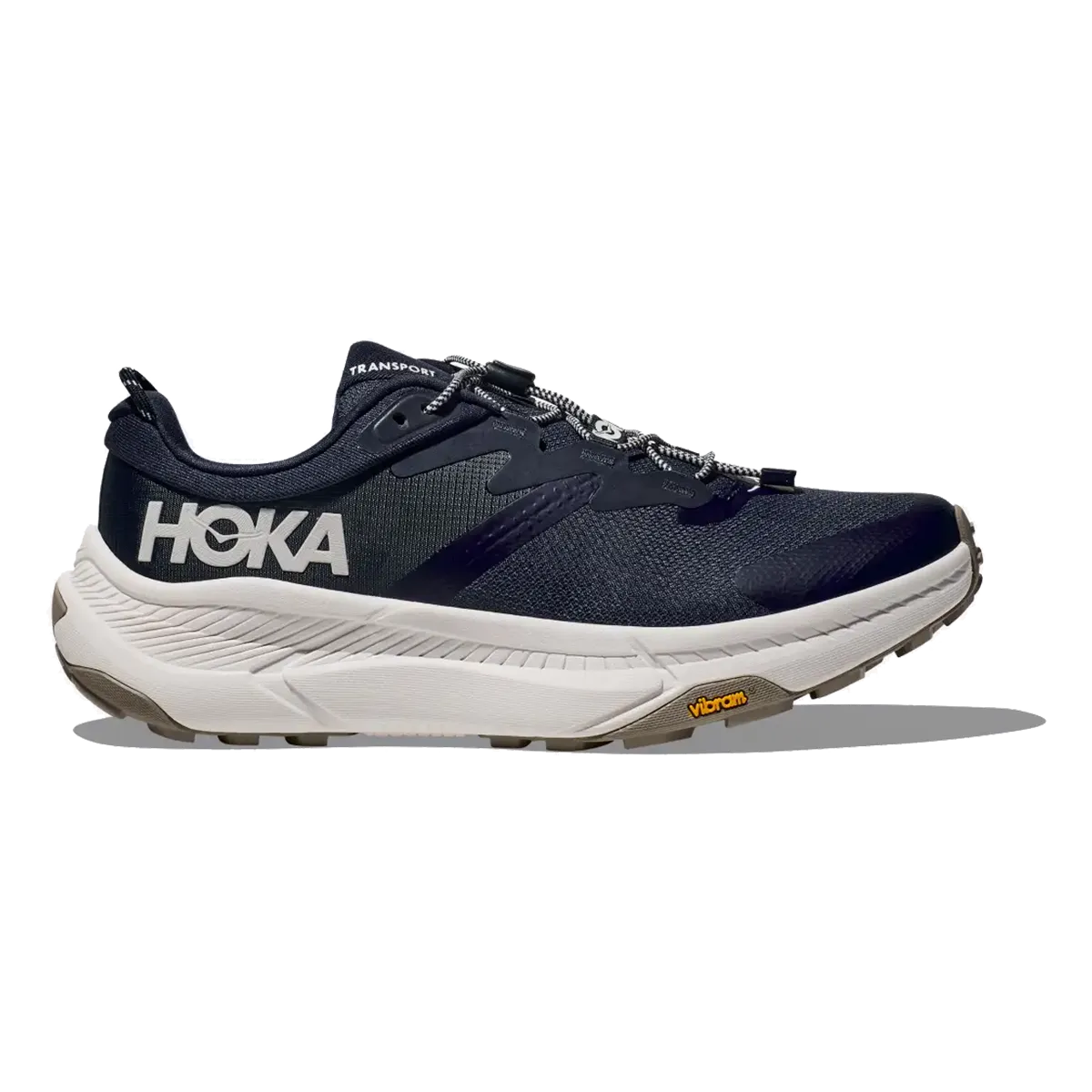 Hoka Transport - Varsity Navy - White running in a mud pot area shoes Hyperbolic Heel Counter