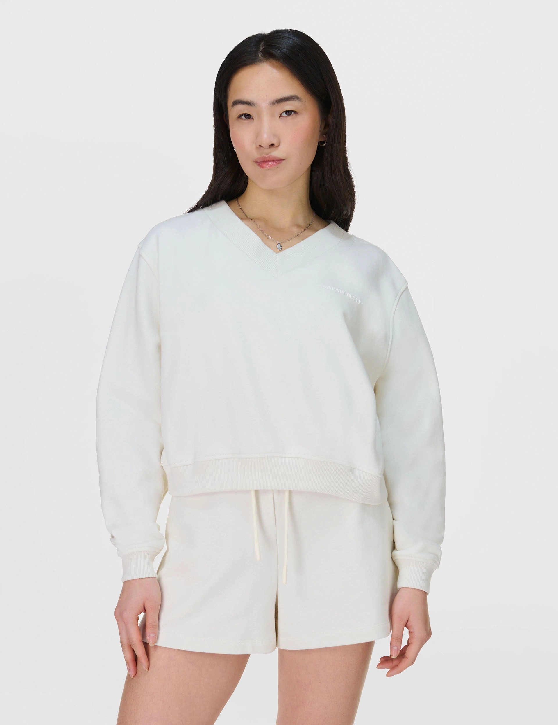 Revive Crop V-Neck Sweatshirt - Lily White Casual Sweatshirt Chic Skirt