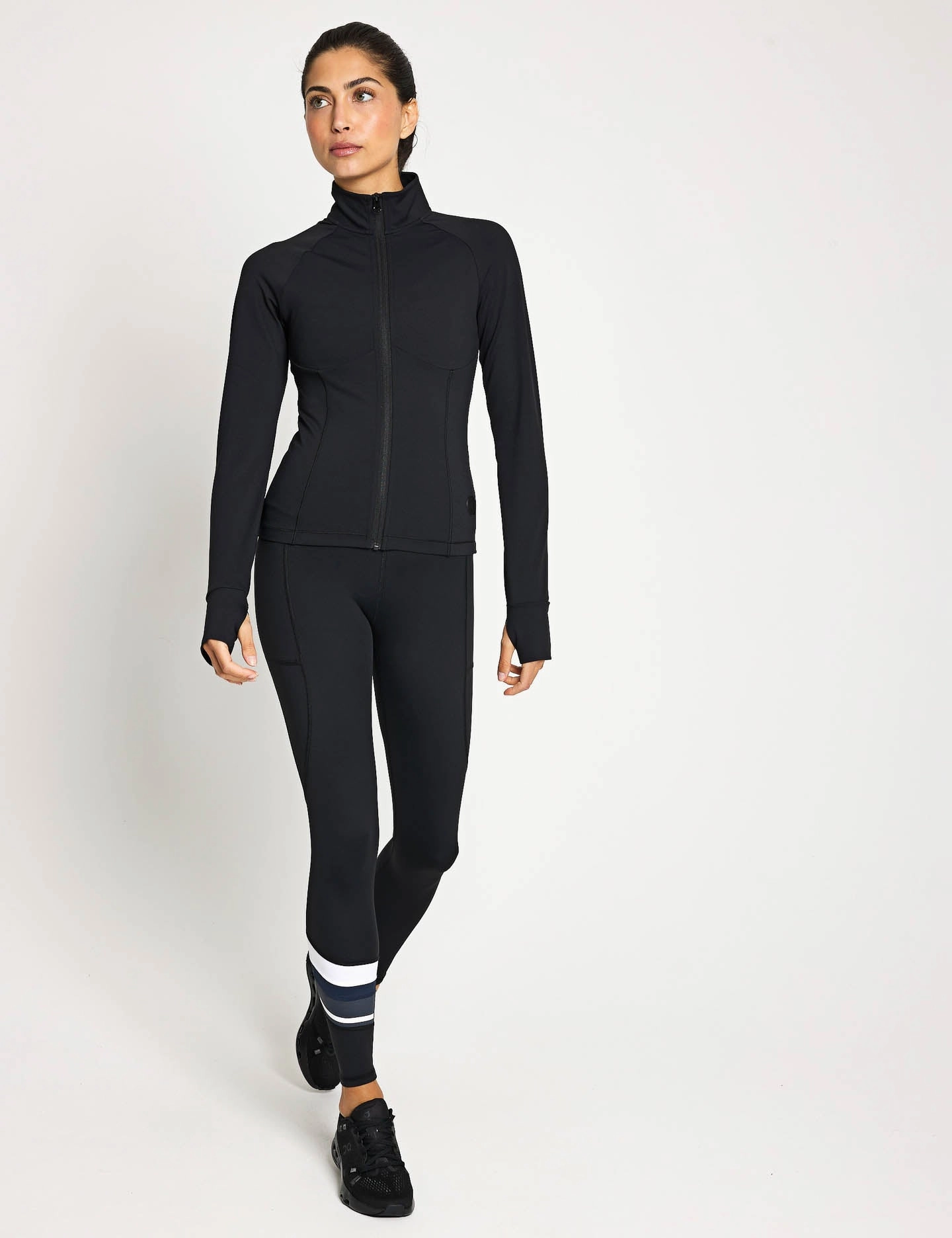Zuri Contoured Zip Thru Top - Black moisture - wicking