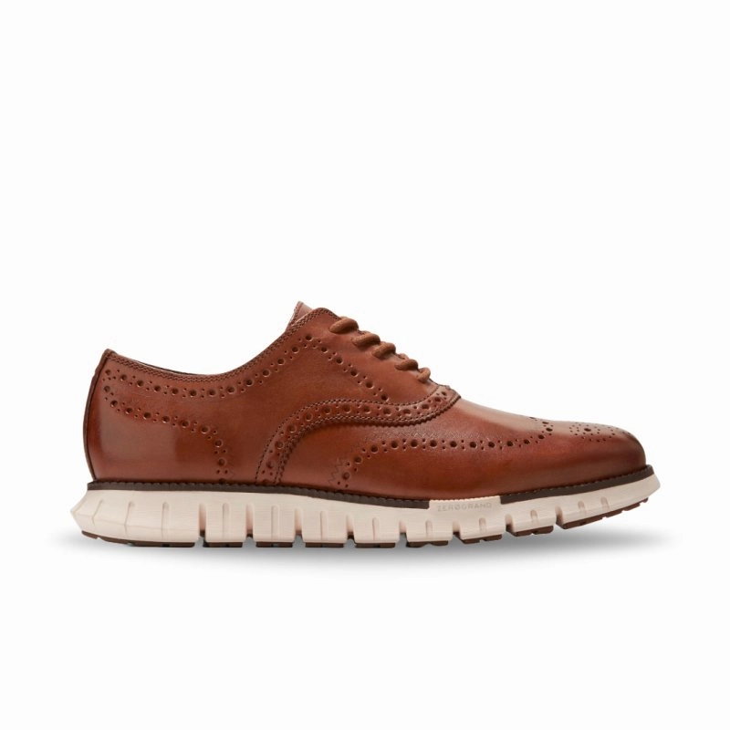 Cole Haan Men's ZEROGRAND Remastered Wingtip - British Tan/Ivory UniversalFit AbrasionResistantClothing