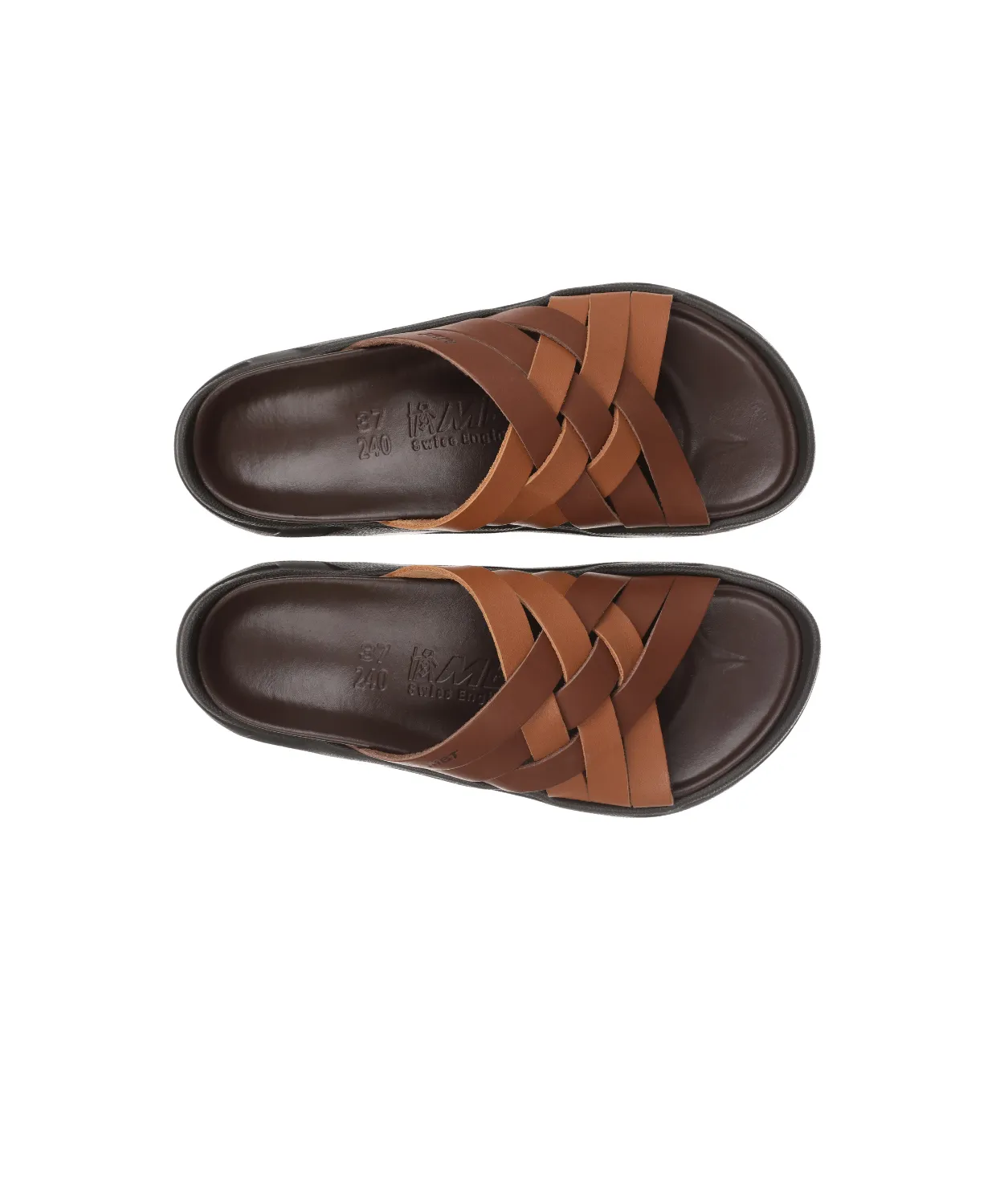 MBT Riku Brown Womens Recovery Slides running in a bus station area shoes