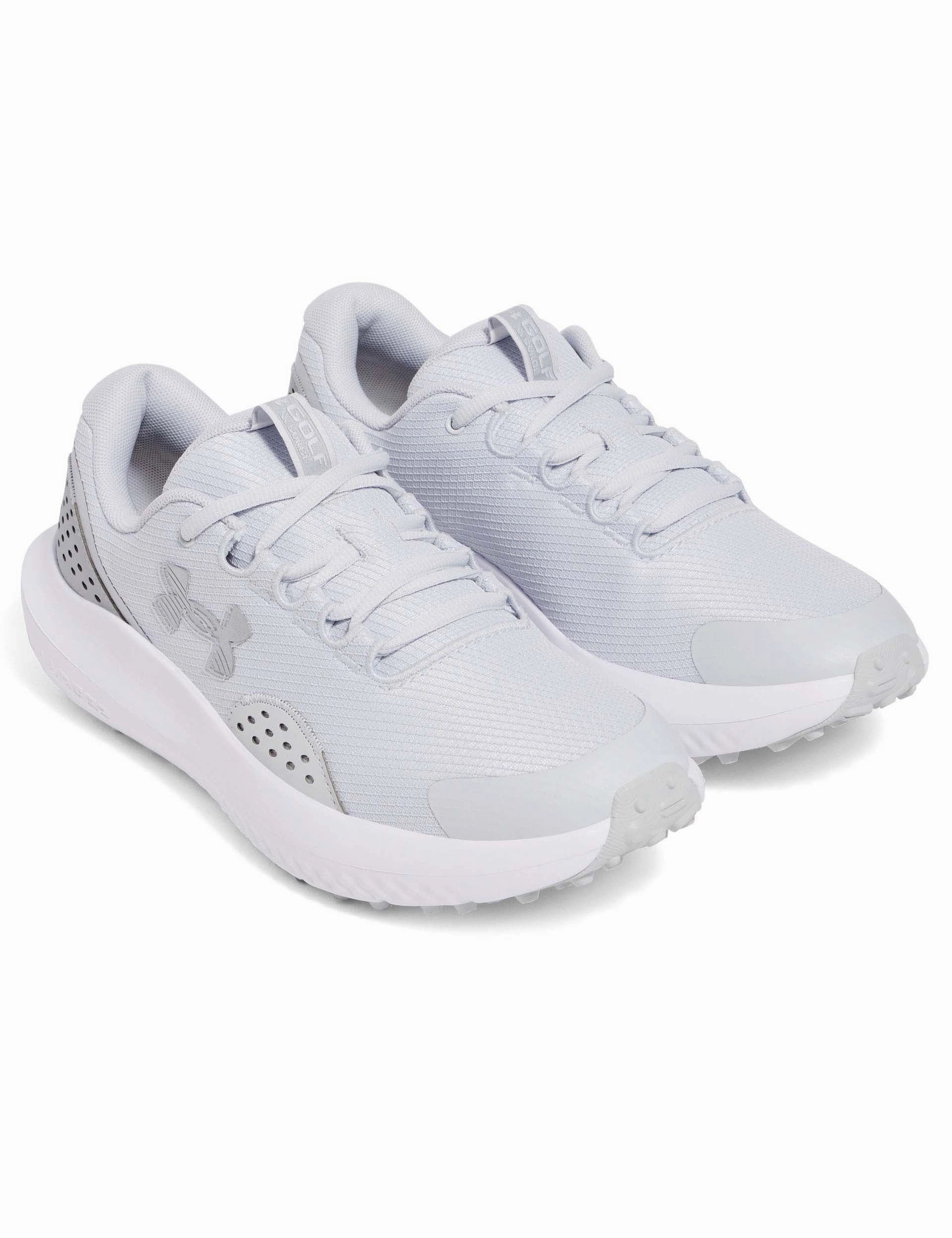 Surge Golf - Halo Gray/Halo Gray/Metallic Silver Rock Protection running in a volcanic area shoes